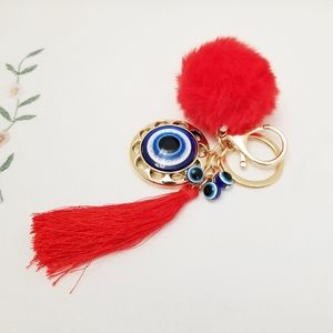 Evil Eye Red Pom Pom Protection Women's Key Chain. New